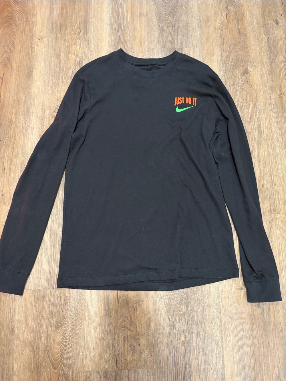 Nike Black Long-Sleeve Tee with Orange 'Just Do It' and Green Swoosh
